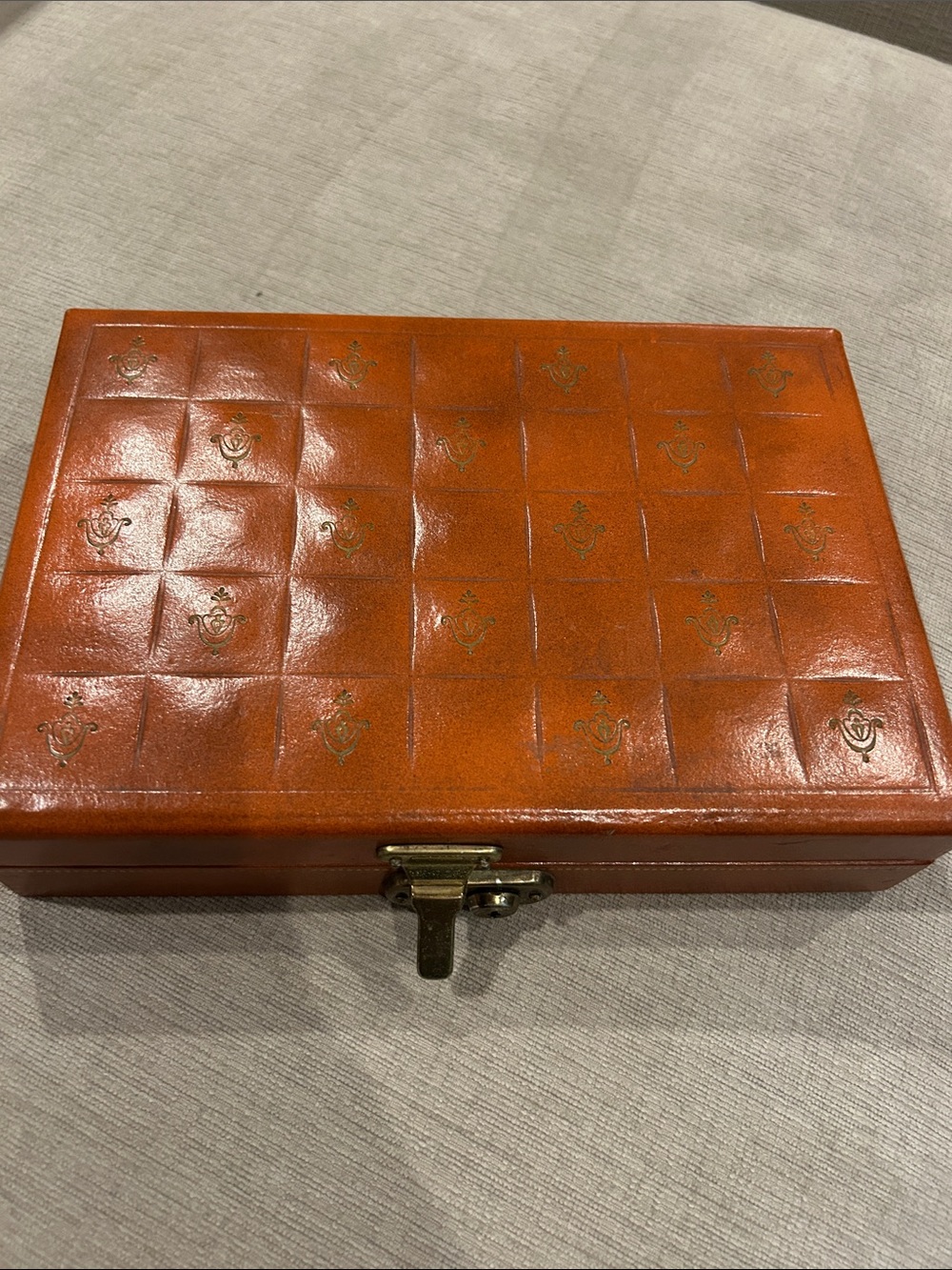 Vintage tan/cognac faux-leather or leather-tooled valet/jewelry box